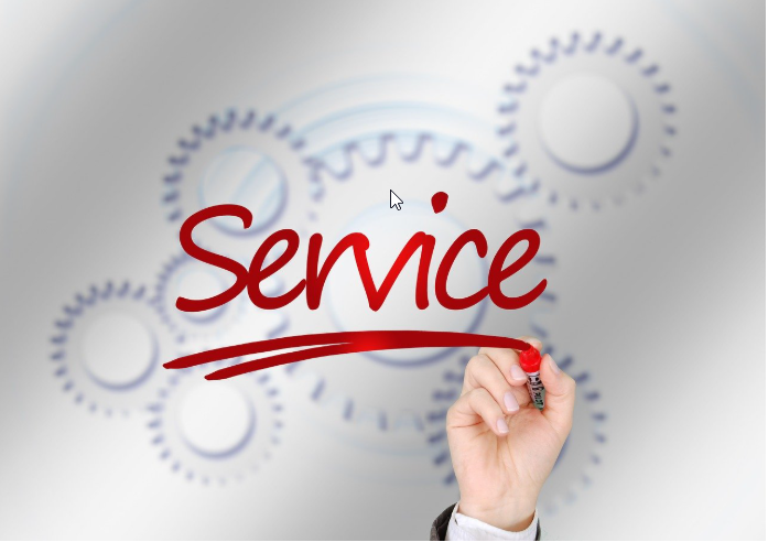 A hand writing the word Service representing professional Brooklyn landscape garden services and estimates. A hand writing the word Service representing professional Brooklyn landscape garden services and estimates.